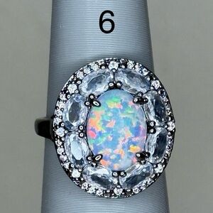 Bomb Party October Opal on Hematite 
Size 6
